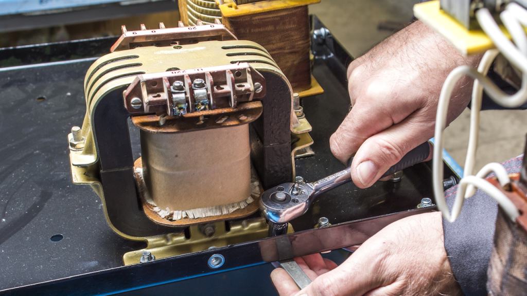 installation of transformer insider a welder