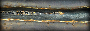 Defect Due to High Amperage and Wire Feed Speed